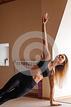 Group Of Women Doing Yoga Indoors