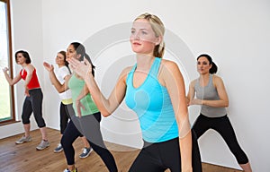 Group Of Women Exercising In Dance Studio