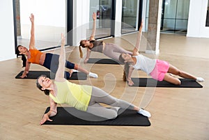 Group of women exercising during pilates class