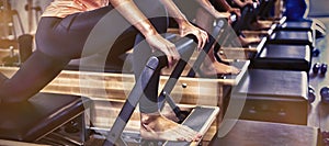 Group of women exercising on reformer