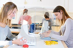 Group women in sewing workshop