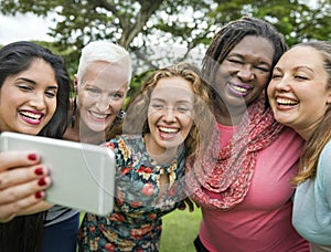 Group Of Women Taking Pictures Concept