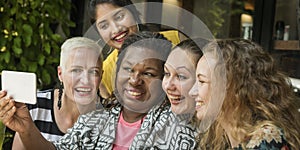 Group Of Women Taking Pictures Concept