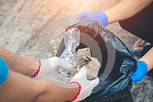 Group women volunteer help garbage collection charity.