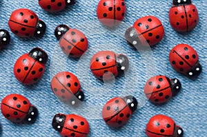 A group of wooden ladybugs.