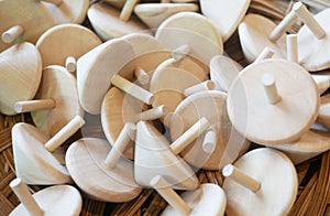 Group of wooden spining toy.