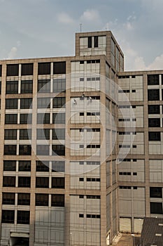 Group of workers cleaning windows service on high rise office building