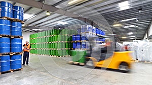 Group of workers in the logistics industry work in a warehouse w