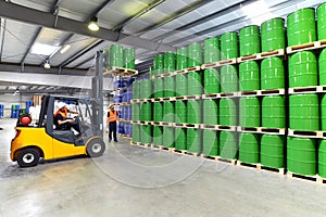 Group of workers in the logistics industry work in a warehouse w