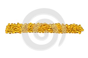 A group of yellow capsules isolated on a white background