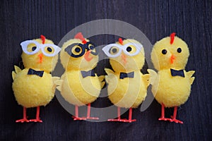 Four yellow toy Easter chicks.