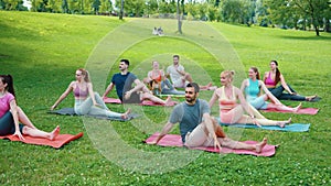 Group Yoga Session in Lush Park