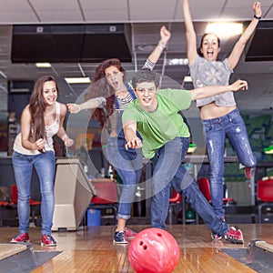Group of young adults having fun playing