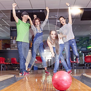 Group of young adults having fun playing