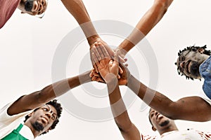 Group of young african american artist man smiling happy with hands united at art studio