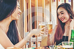 Group of young asian people celebrating beer festivals happy while enjoying home party