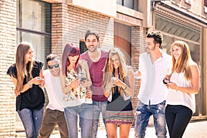 Group of young best friends having fun together walking in town