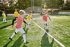 A group of young boys enthusiastically