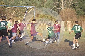 Group of young boys playing soccer