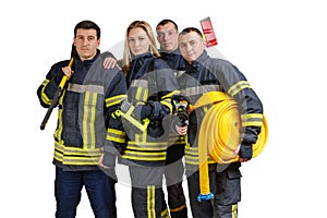 Group of young brave firefighters in uniform isolated