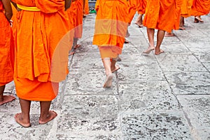 Group of young Buddhist novice monks walking