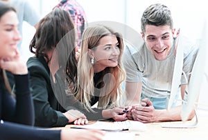 Group of young business people discussing new ideas