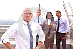 Group of young business people posing outdoor