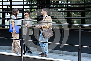 Group of young business people product strategy experts waiting for staff meeting with employer from human resources for job