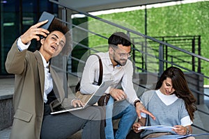 Group of young business people product strategy experts waiting for staff meeting with employer from human resources for job