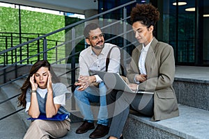 Group of young business people product strategy experts waiting for staff meeting with employer from human resources for job