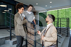 Group of young business people product strategy experts waiting for staff meeting with employer from human resources for job