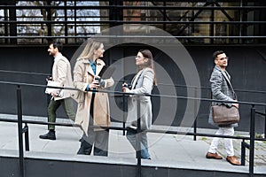 Group of young business people product strategy experts waiting for staff meeting with employer from human resources for job