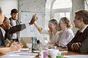 Group of young business professionals having a meeting, creative office