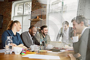 Group of young business professionals having a meeting, creative office