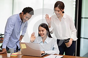 Group of Young business woman meeting with Customer or business team via video conference call at Office