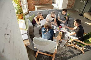 Group of young caucasian office workers have creative meeting to discuss new ideas