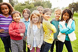 Group Of Young Children Hanging Out In Park