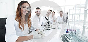 Group of young clinicians experimentation in research laboratory