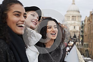 Group Of Young Female Friends Visiting London In Winter