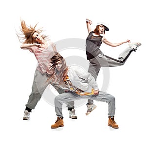 Group of young femanle hip hop dancers on white background