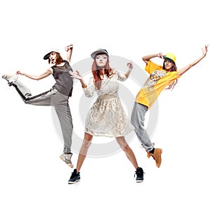 Group of young femanle hip hop dancers on white background