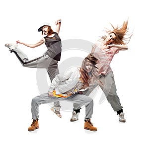 Group of young femanle hip hop dancers on white background