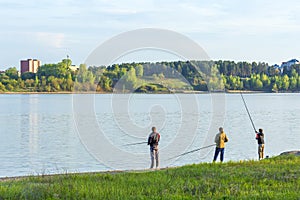 A group of young fishermen fishing in the Gulf of Berdsk