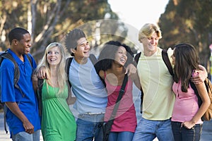 Group of young friends chatting outside