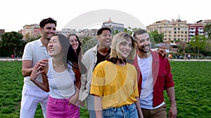 Group of young friends having fun together outdoors