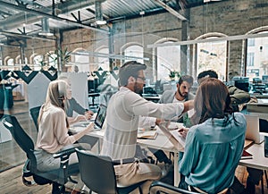 Group of young modern people in smart casual wear