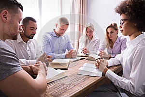 Group Of Young Multiethnic People Reading Bible