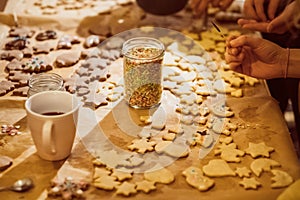 Group of young people baking cookies for christmas