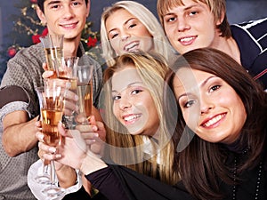 Group young people drink champagne.