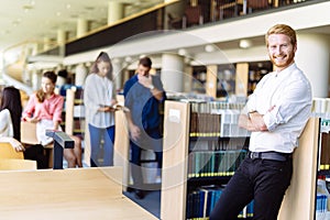 Group of young people educating themselves in a library